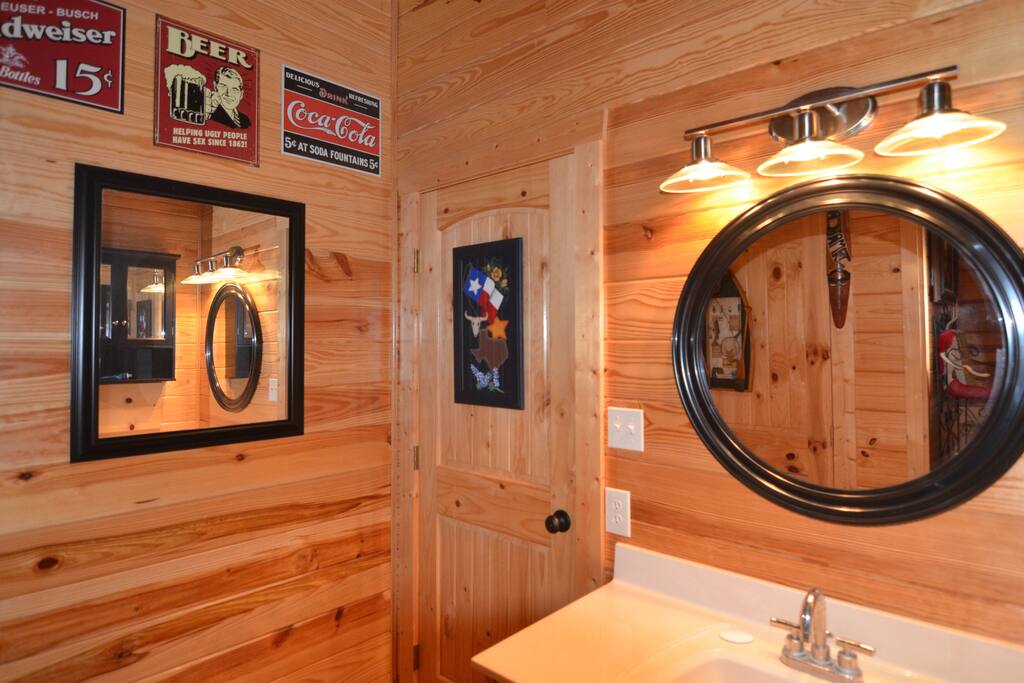 The bathroom, which also houses the laundry machine.