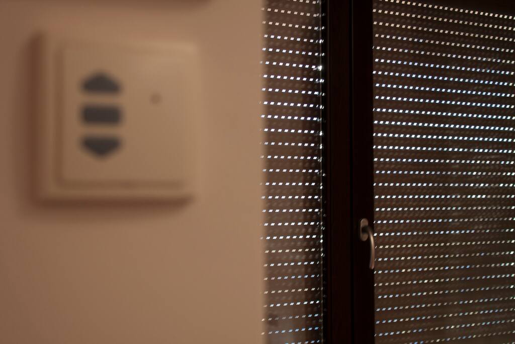 (Bedroom). Blackout blinds for perfect sleep at the push of a button.