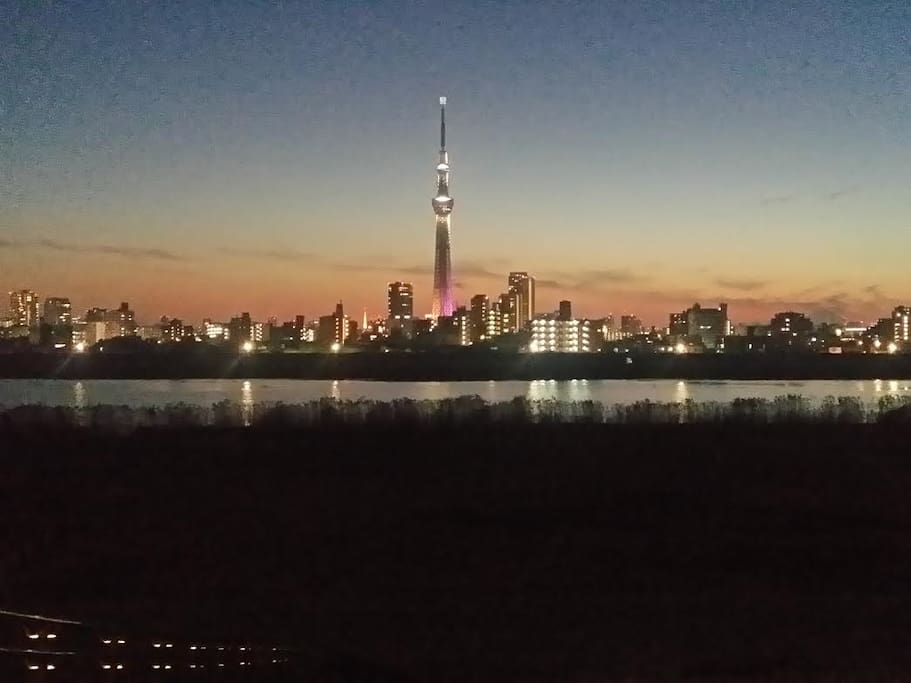 Beautiful sunsets behind Tokyo Sky Tree from the nearby riverside. Tokyo Tower and Mt. Fuji can be seen on clear days