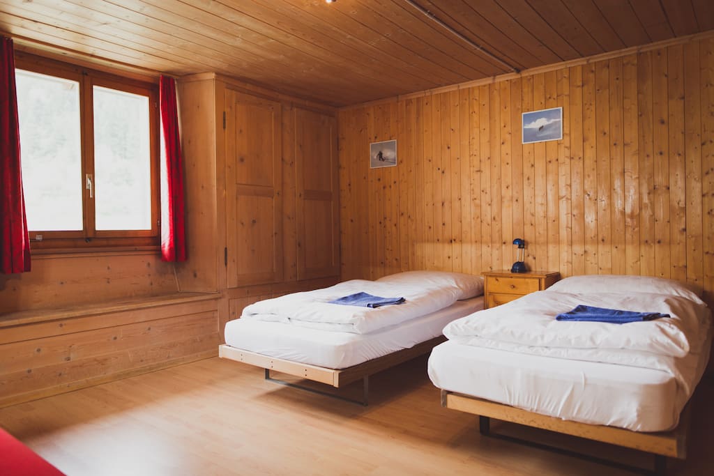 Twin or double room with extra sofa bed wooden chalet style