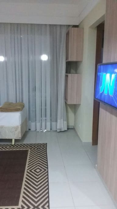 Sala com sofá-cama