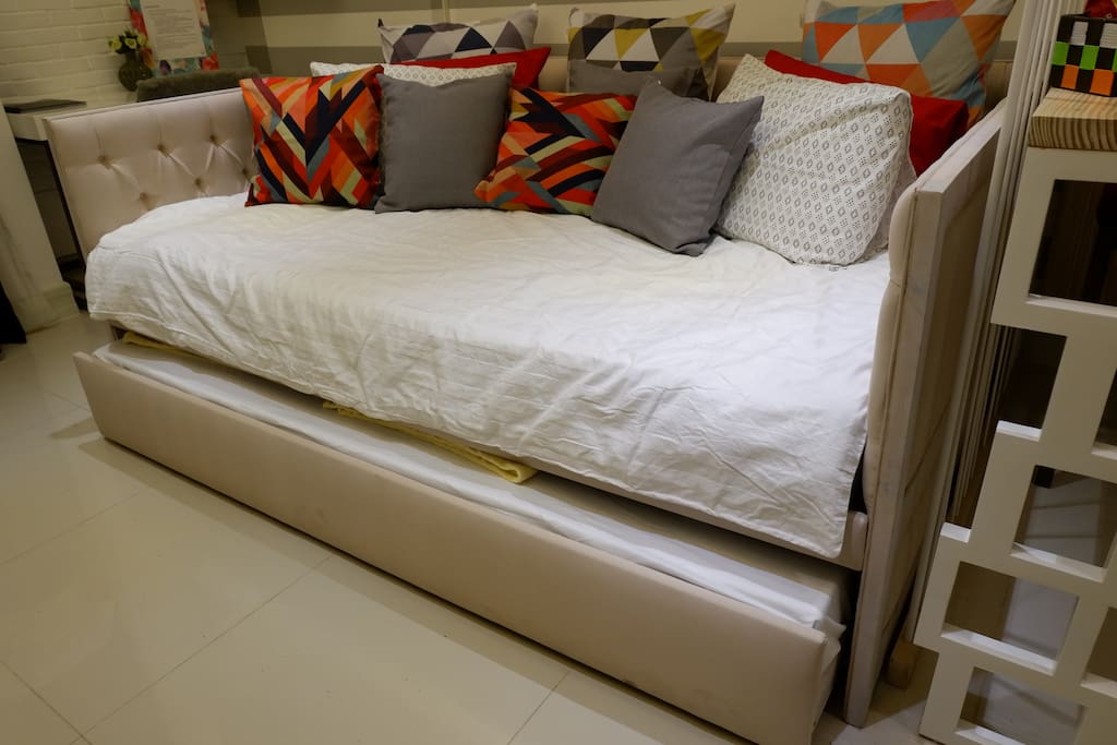 Bespoke queen-sized sofa bed with a pull-out bed that can accommodate 3 persons