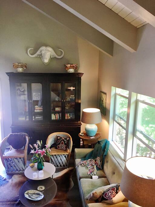 Comfortable, elegant living room with vaulted ceilings