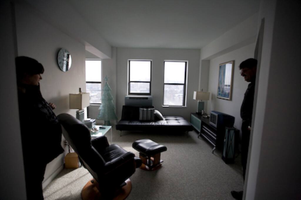 Living room with futon that sleeps 2