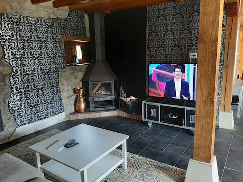 Stone and wood house, with land. Close to everything.