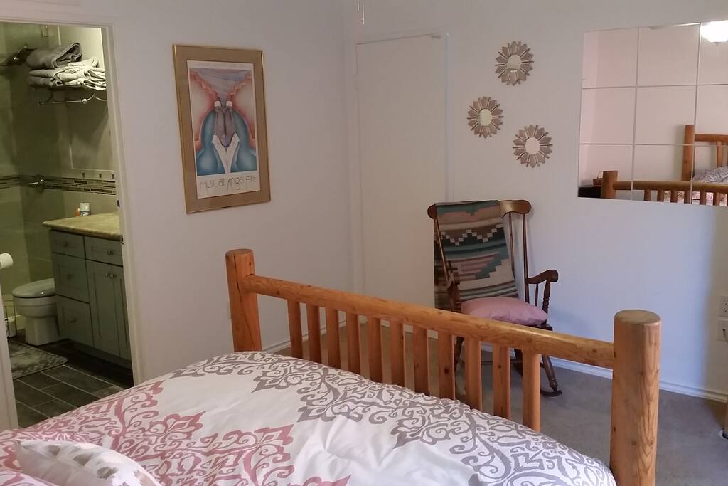 Master bedroom with a lot of natural lighting.
