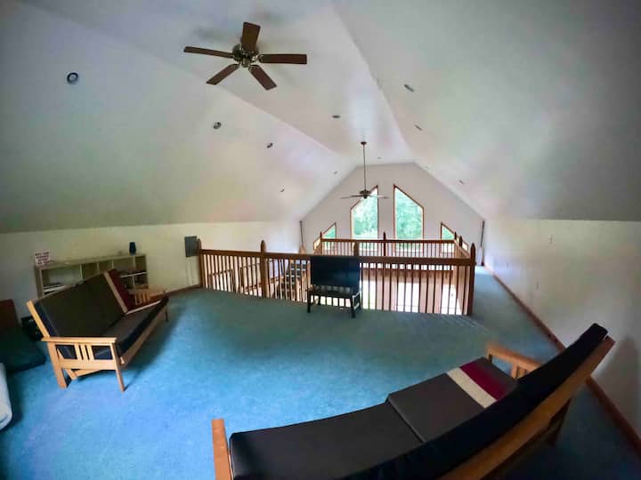 Loft with 2 queen size futons, TV, and books and games