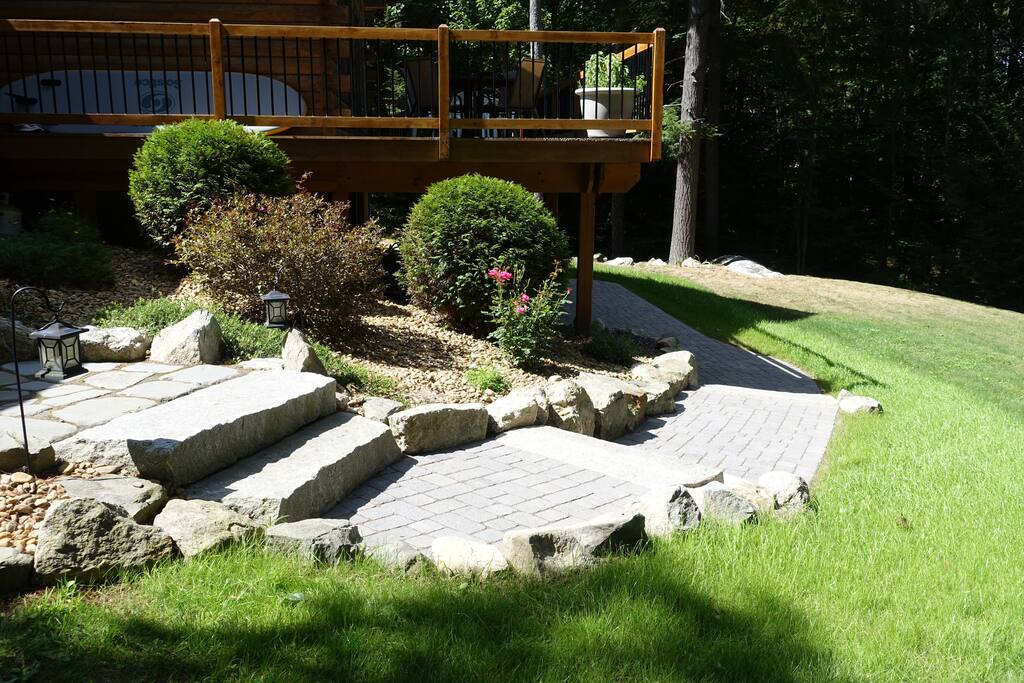 The walkway leads you around the deck to your private garden level apartment.