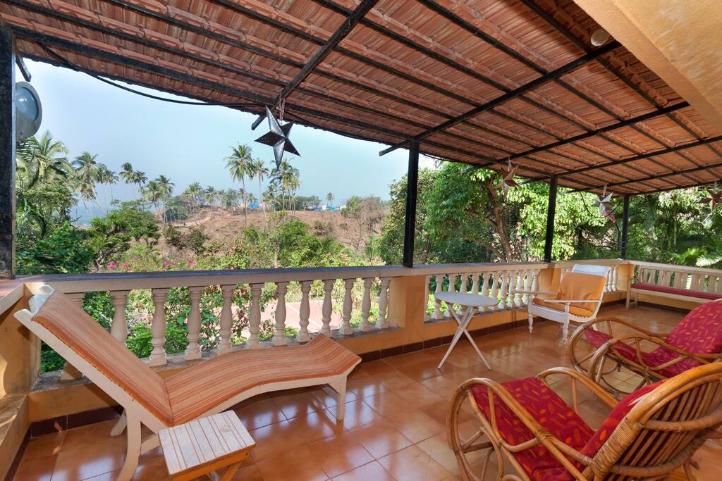 Balcony with lot of room to sit and enjoy the scenery