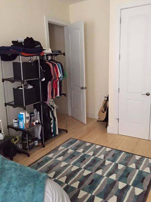 Open Floor with Clothing Rack
