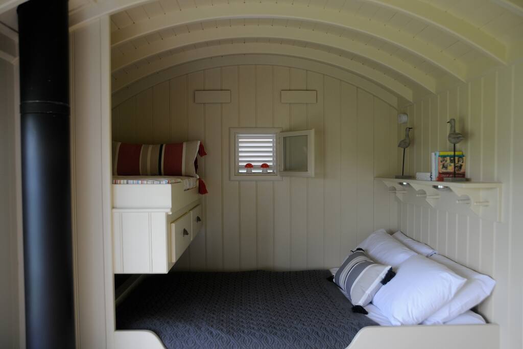 The kingsize bed with small 5ft bunk.