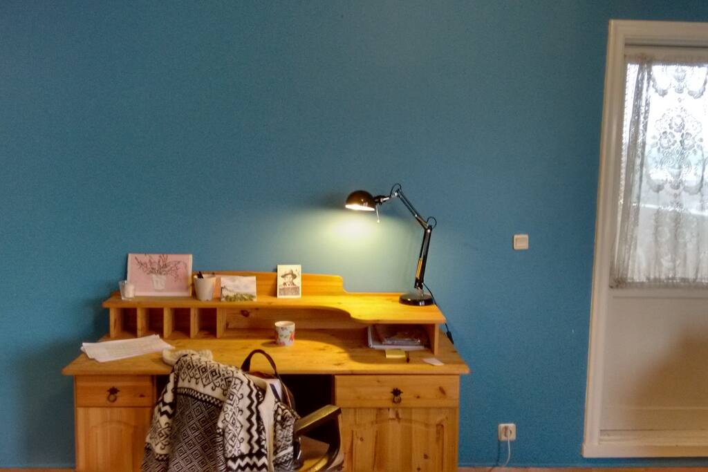 Desk with adjustable chair.