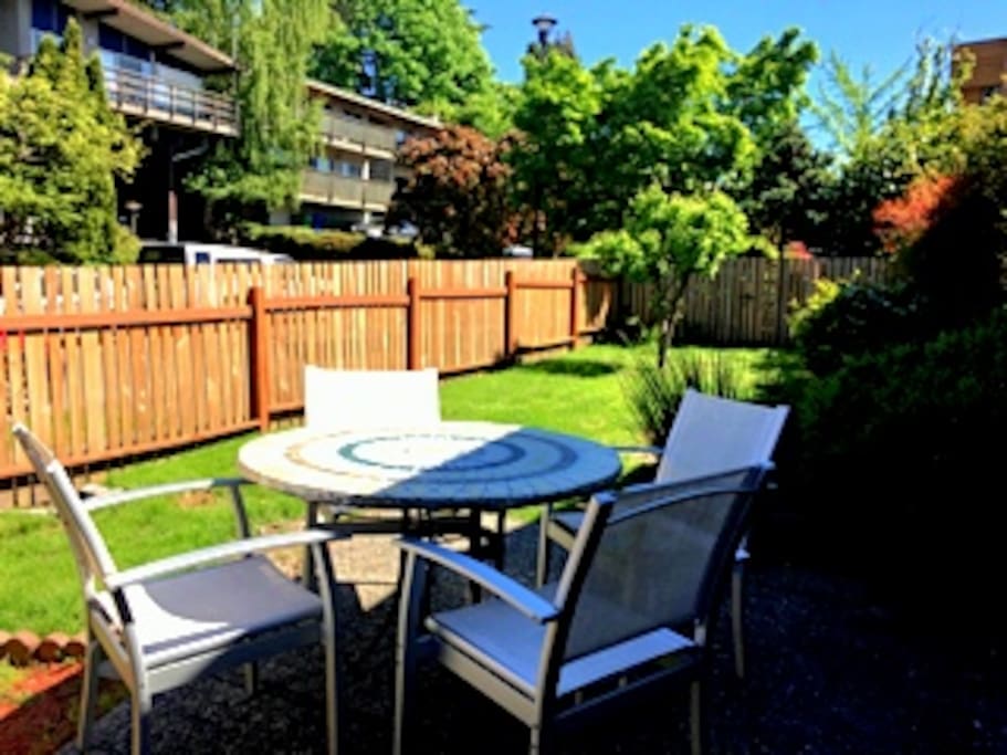 Large fully private fenced yard with outdoor dining and a place to run around and play. And just across the street is a large park with play equipment.