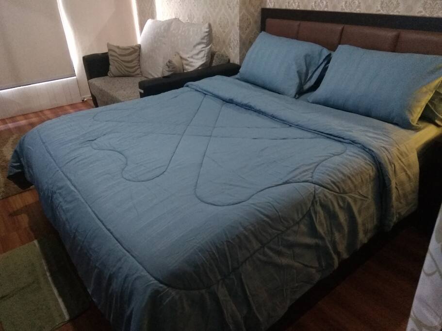 There is Sofa Bed beside the main bed for extra people