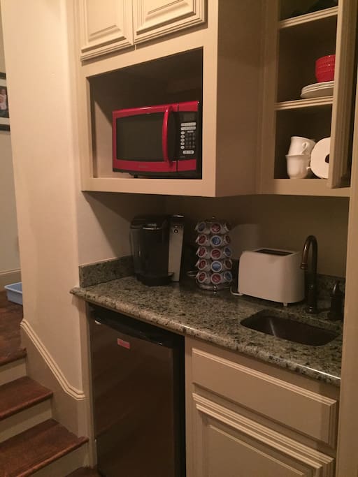 Kitchenette upstairs includes sink, toaster, mini frig, microwave, Keurig coffee and coffee maker, basic dishes. Small oven available upon request.