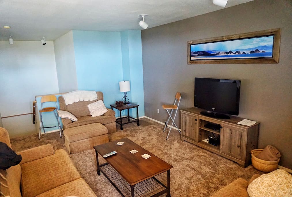 Living room including a queen size pull out bed