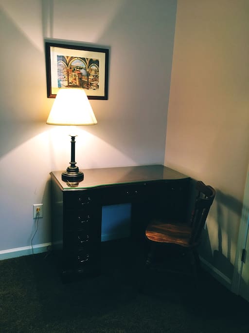 Set up your office-away-from-home at a beautiful antique desk. Office supplies for your use are in the drawers. Anything else you need? Simply ask.