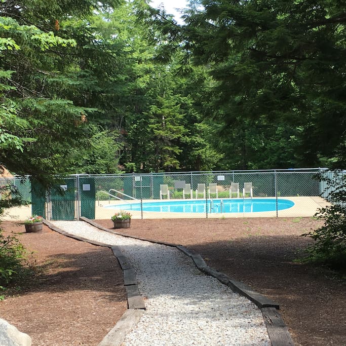 heated pool open in the summer, secured by the locked gate for safety.