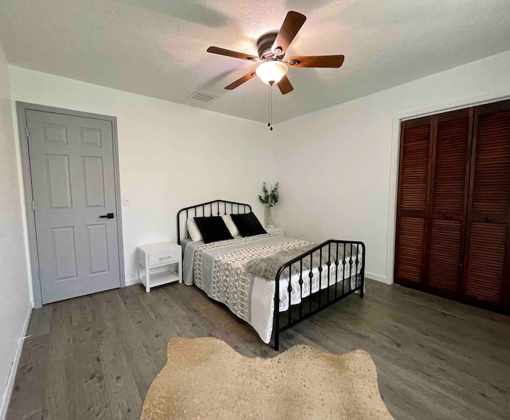 Minimalist bedroom has a full size bed with memory foam.  

Inflatable twin mattress available in the closet for larger groups. 