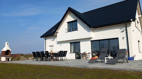 Villa Koprowo with direct lake access & spa