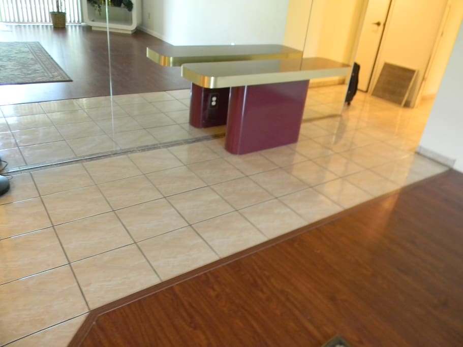 Full Tile and Mirror and Wood Floors
