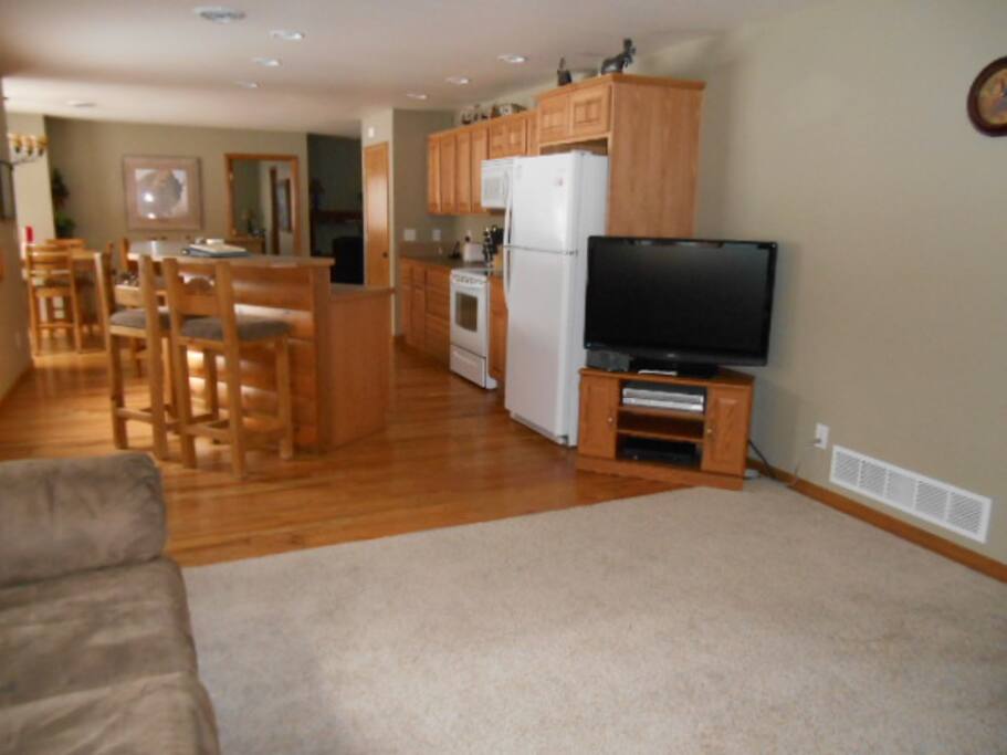 Large flat screen Television with satellite TV.