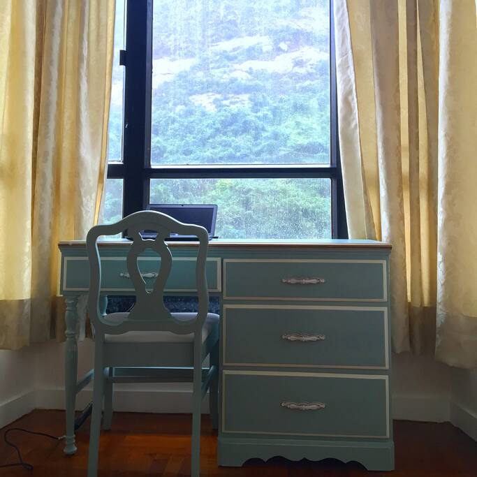 Desk in bedroom overlooking Victoria Peak