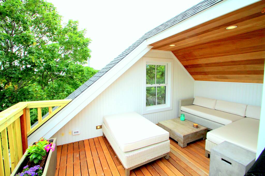 Magnificant deck with ocean & monument views. Heat lamps make this a year round hangout.