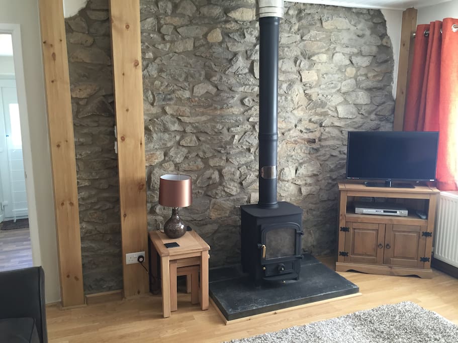Cosy front room with log burner