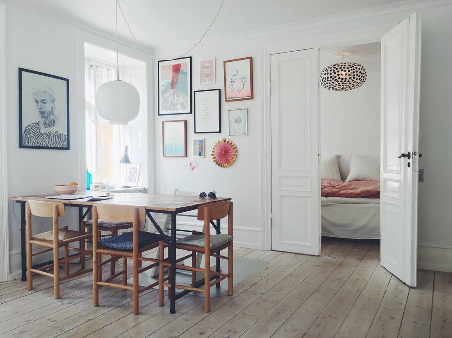 Dining area in bright and cozy living room.