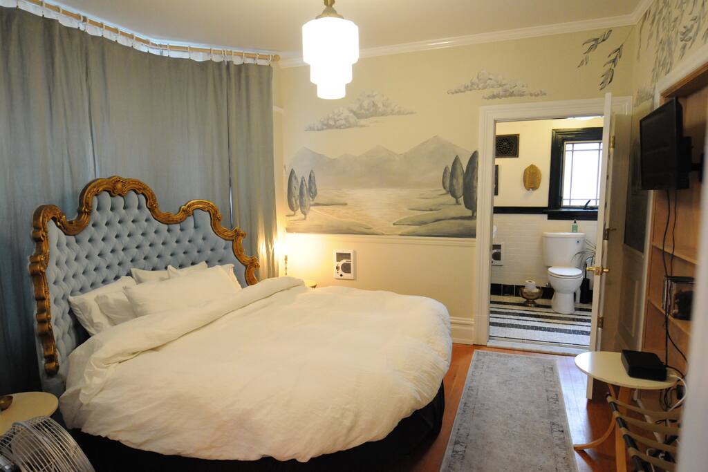 The round bed with part of the mural in the background. Painted by a local artist of the willamette valley.