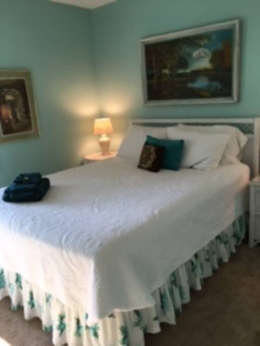 2017 bedroom with new bedspread, sheets and lighting.
