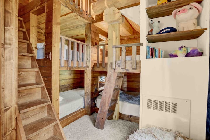 3 more bunk beds and there is one more to the left of the stairs shown in the picture.  Lots of choices!