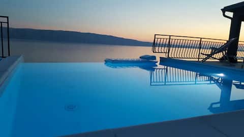 Apartment with gallery on beach with swimming pool