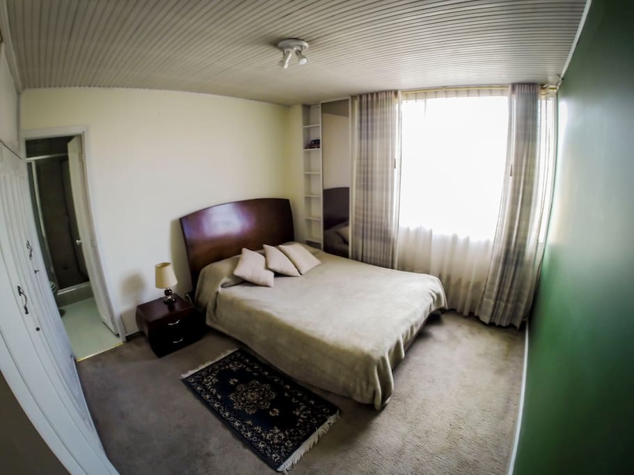 The bedroom with en-suite bathroom.