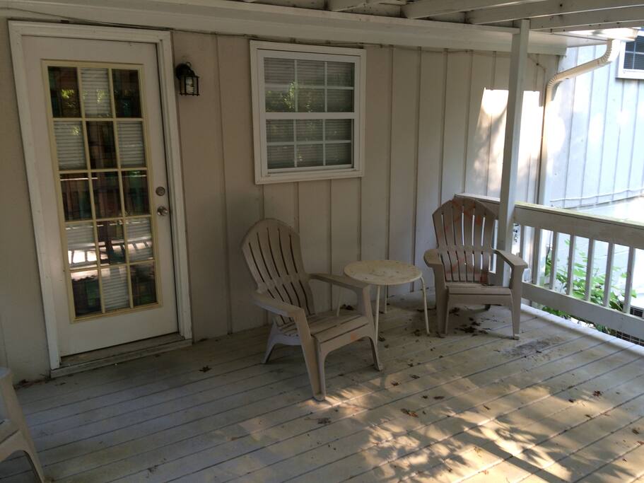 Covered patio leading from the kitchen door.