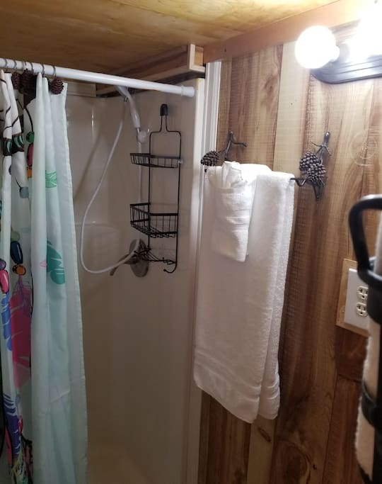 Bathroom with 3/4 sized shower