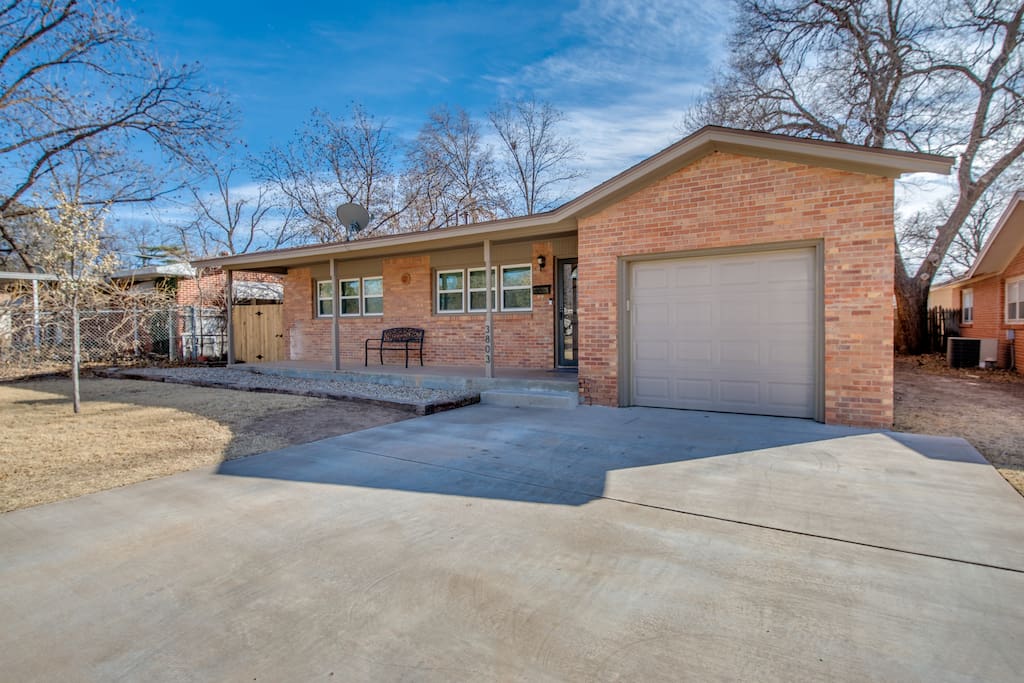 Large driveway. Single car garage