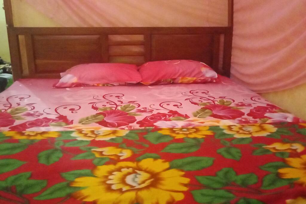 Standard room. We provide a mosquito net and we have a fan for cooling.
