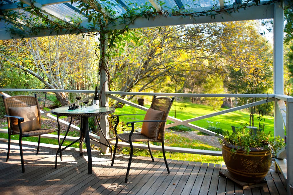 Rear balcony with views to vast gardens and gully beyond
