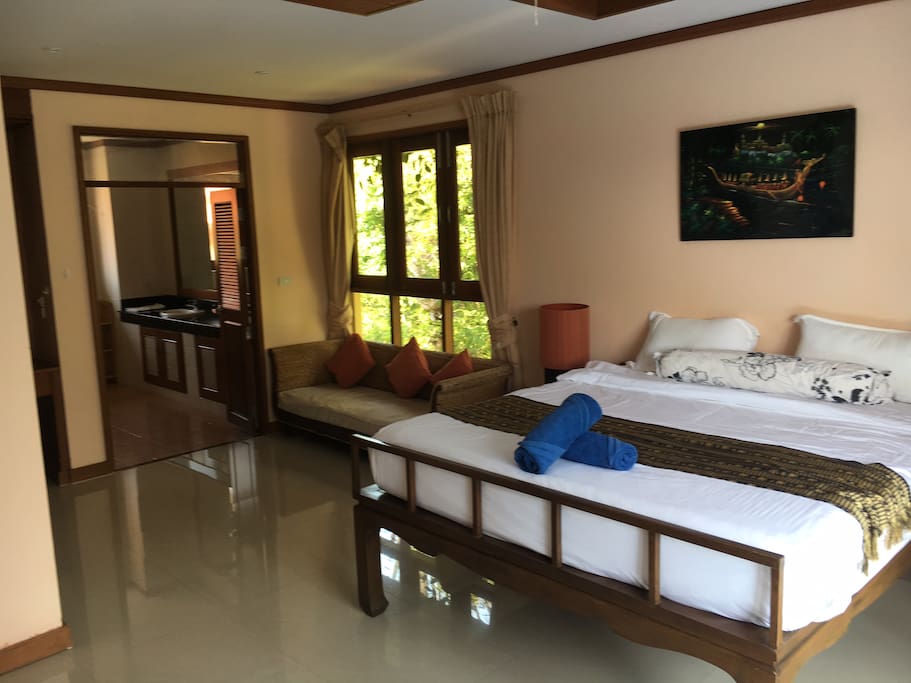 Master bedroom with queen and en suite bathroom