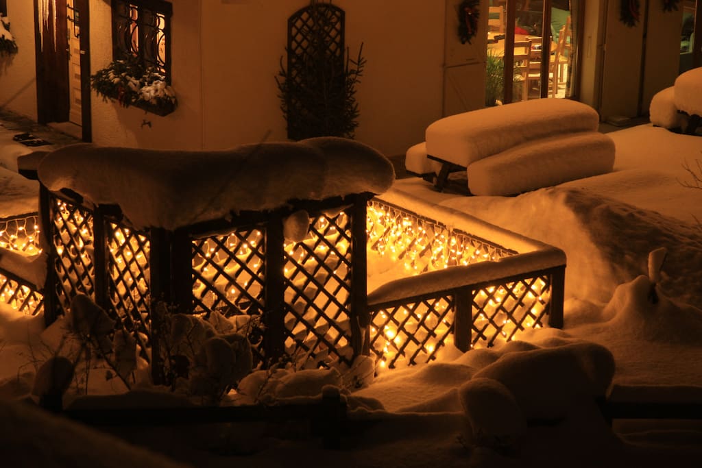 Hot tub deck all lit up at night