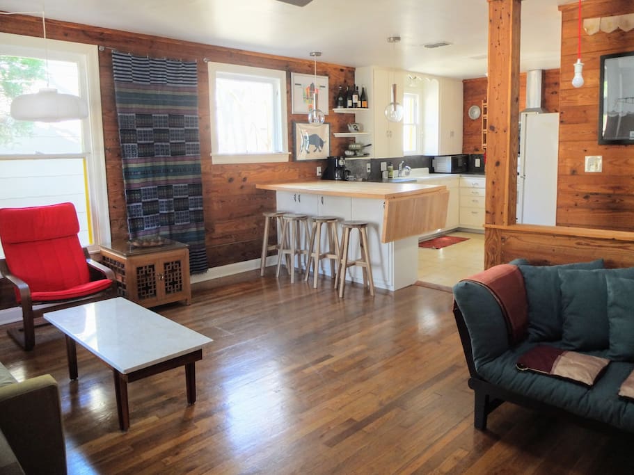 Open floor plan connects living room to spacious kitchen.