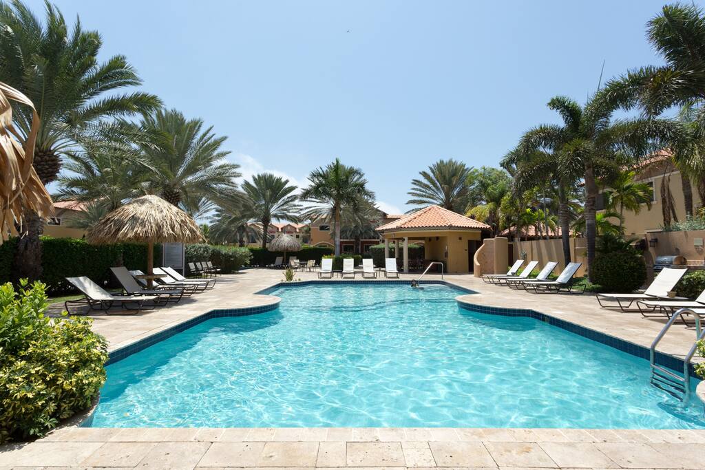 Community Pool with Lounge Chairs, BBQ, Shower and Toilets