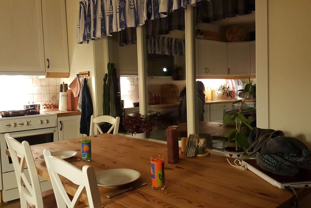 Part of the kitchen, lovely view to the Tromsøsundet (the strait).