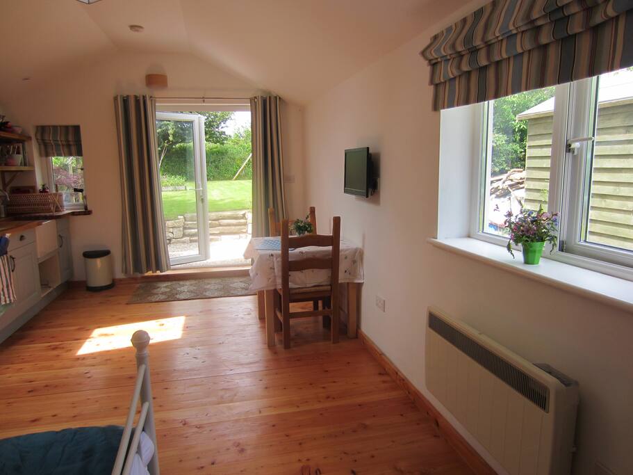 Electric heater and underfloor heating in shower room.
