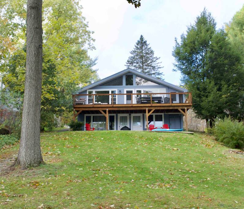 Lakeside view of the house and deck