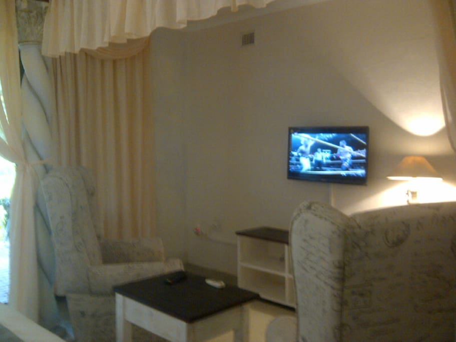 White Suite. Sleeps 2 guests. En suite bathroom comprising of shower, wash basin, separate toilet