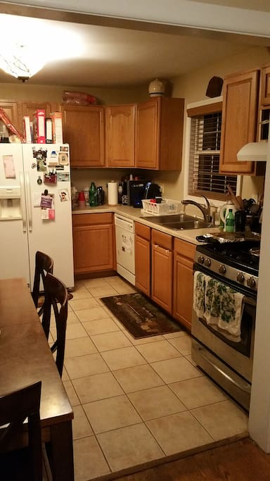 Full kitchen with stove, oven, micro, toaster oven, dishwasher, filtered water dispenser, and Keurig