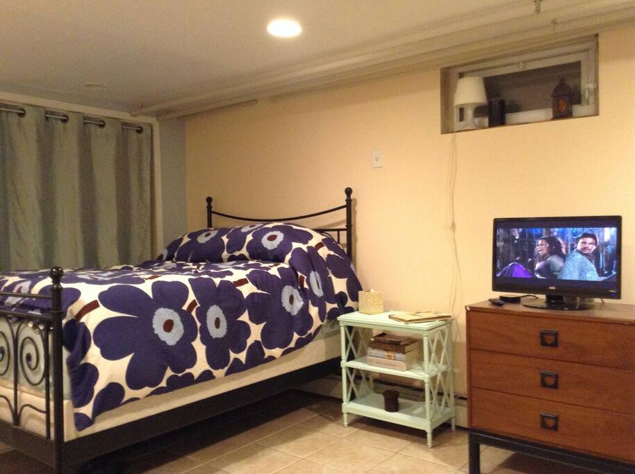 Comfy bed and a closet.